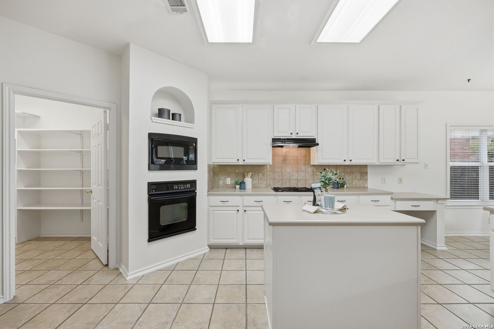 12910 Green Cedar Helotes, TX 78023 - Photo 9 of 65 a kitchen with stainless steel appliances granite countertop a refrigerator sink and stove