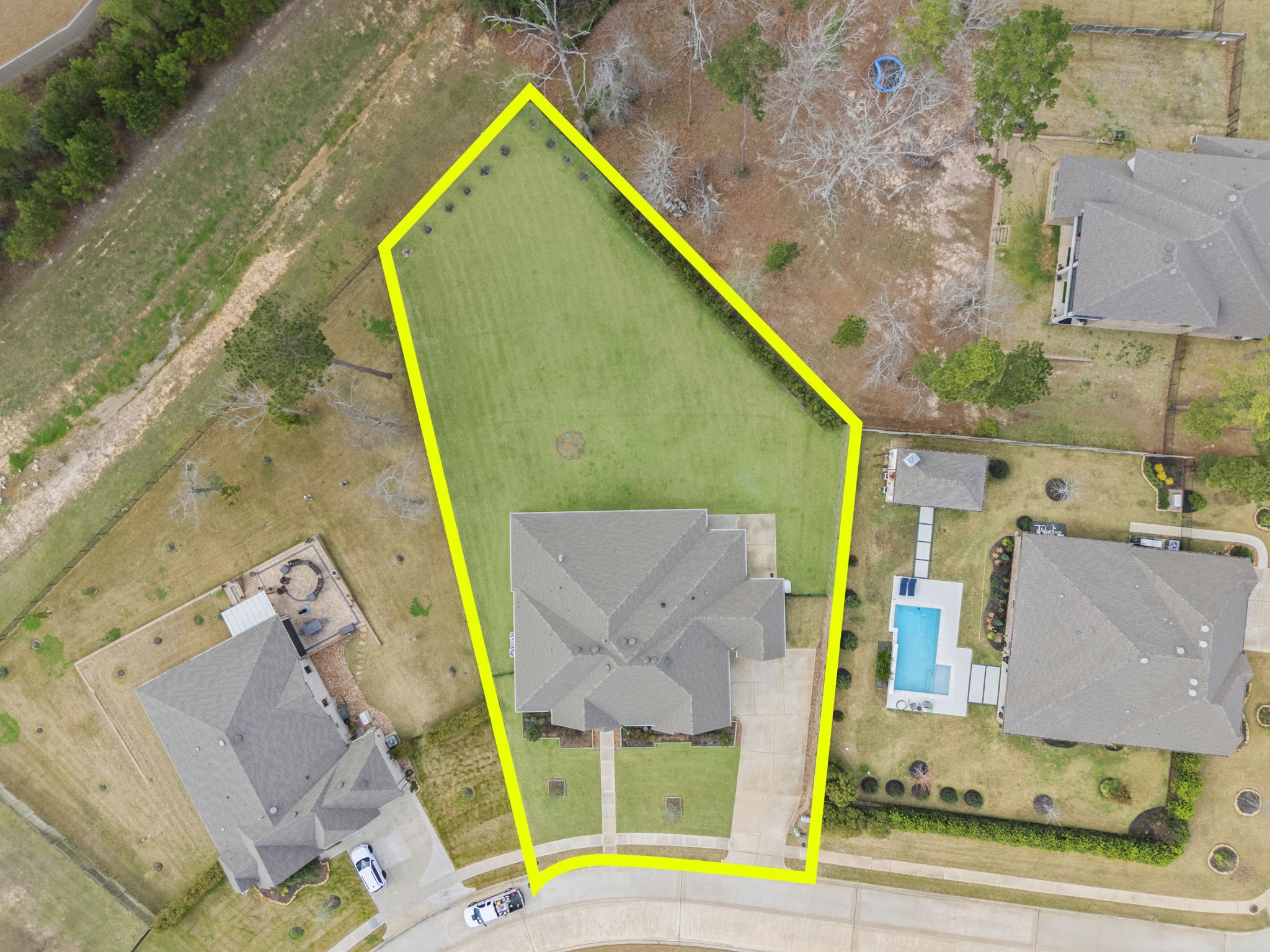 14019 Beartooth Bend Trail Conroe, TX 77384 - Photo 27 of 28 an aerial view of residential house with swimming pool