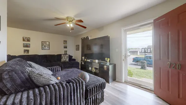 a bedroom with a bed and a couch
