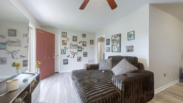 a living room with furniture and a couch