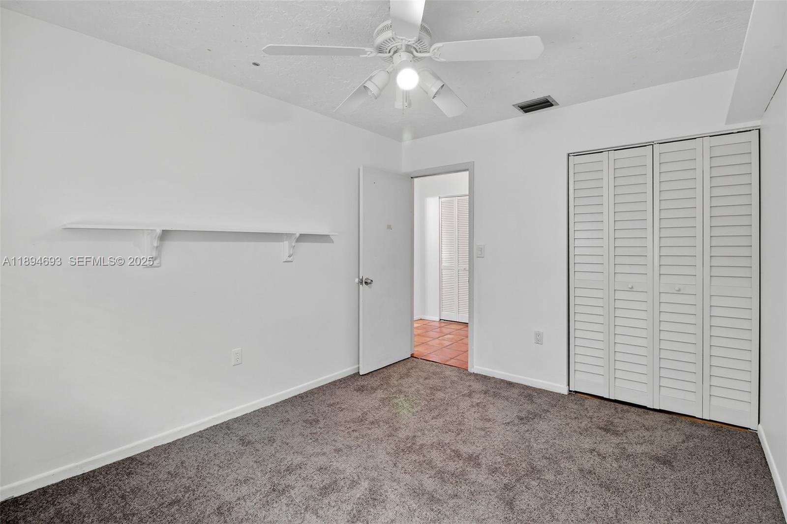 13830 Southwest 108th Street Miami, FL 33186 - Photo 28 of 40 a view of an empty room