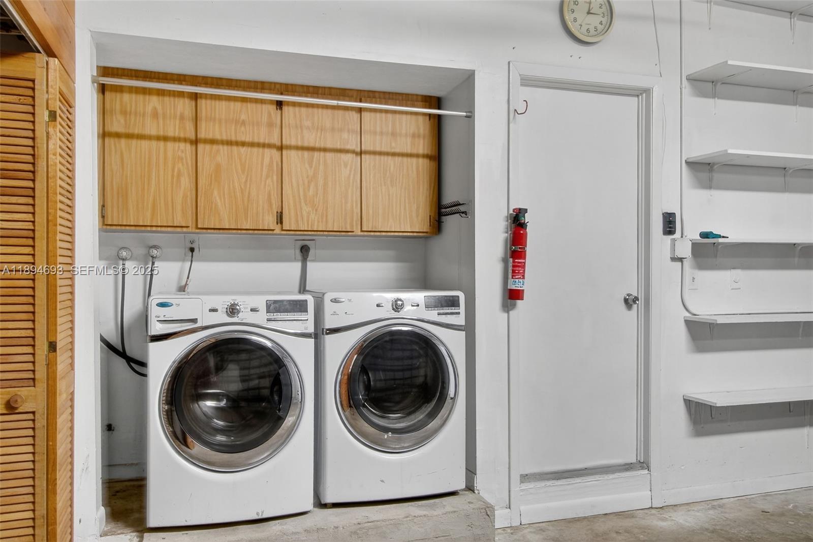 13830 Southwest 108th Street Miami, FL 33186 - Photo 38 of 40 a utility room with dryer and washer