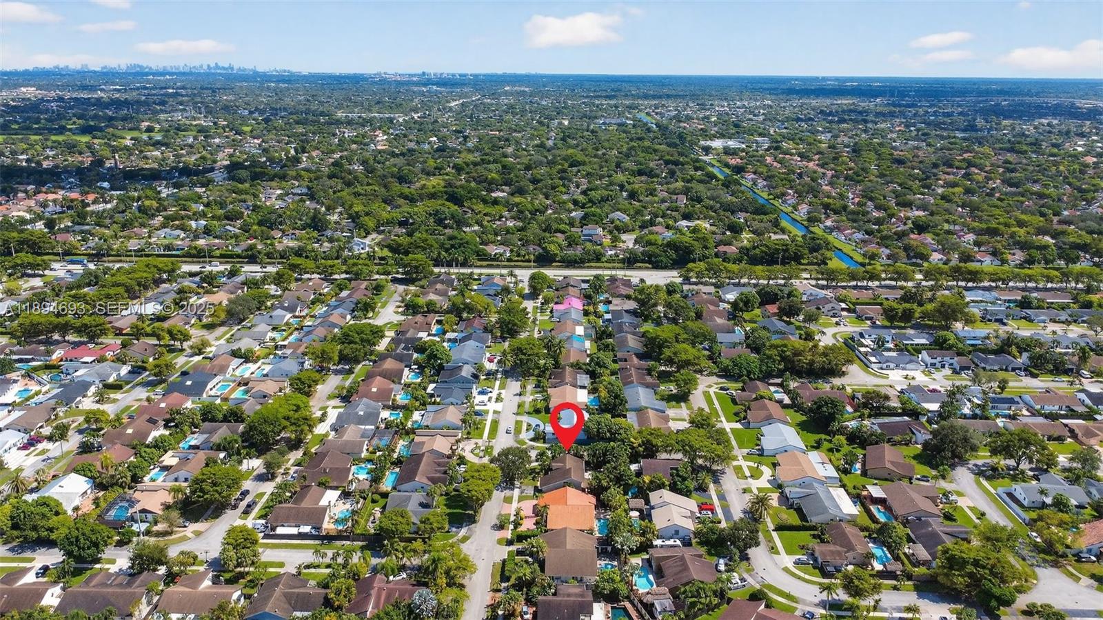 13830 Southwest 108th Street Miami, FL 33186 - Photo 7 of 40 a view of city and mountain