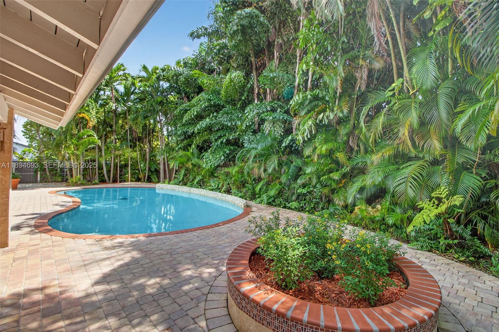 13830 Southwest 108th Street Miami, FL 33186 - Photo 8 of 40 a view of outdoor space and yard