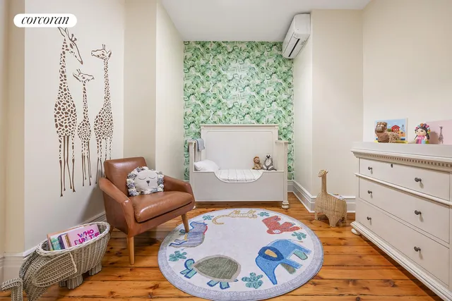 a bath room with a couch and a table