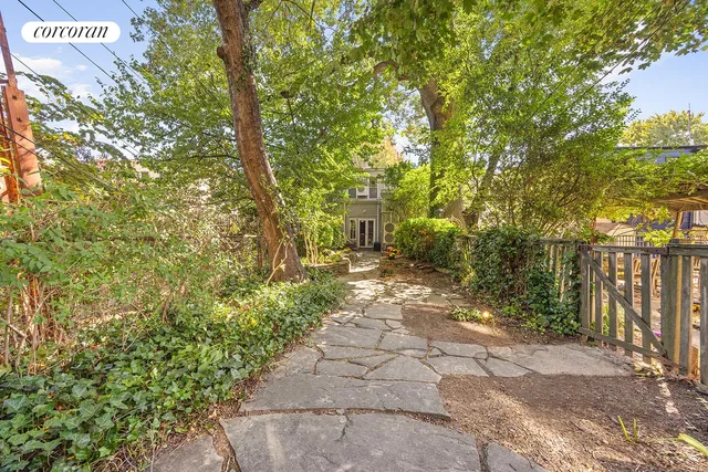 a view of a pathway of a yard