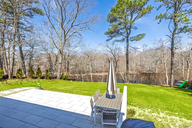 a view of a backyard with a garden