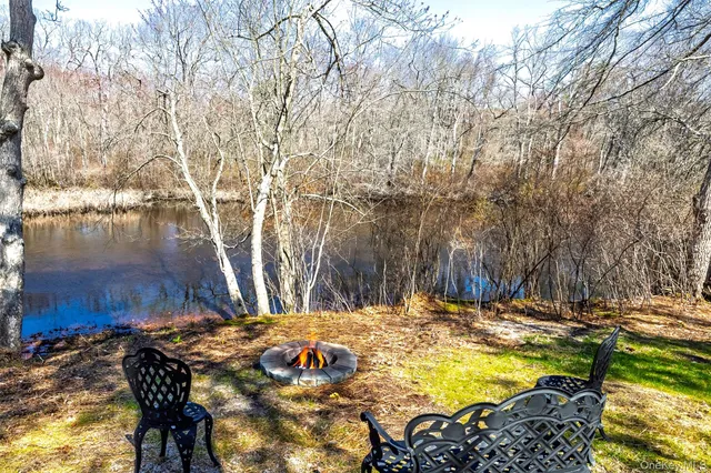 a view of swimming pool with a yard