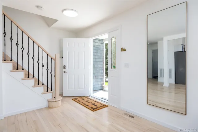 a view of livingroom with furniture and stairs