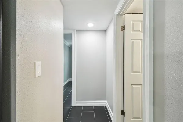 a picture of a bathroom with a shower