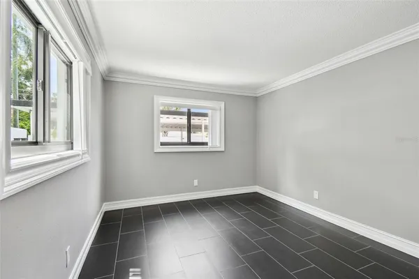 a view of a hallway with washer and dryer