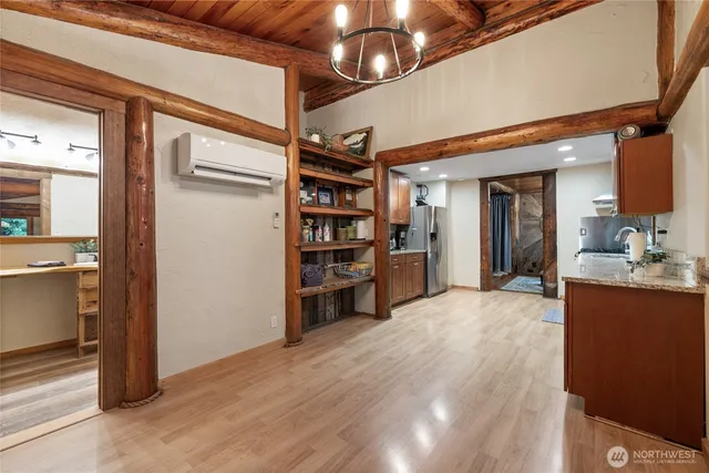 a view of a kitchen with furniture and a kitchen