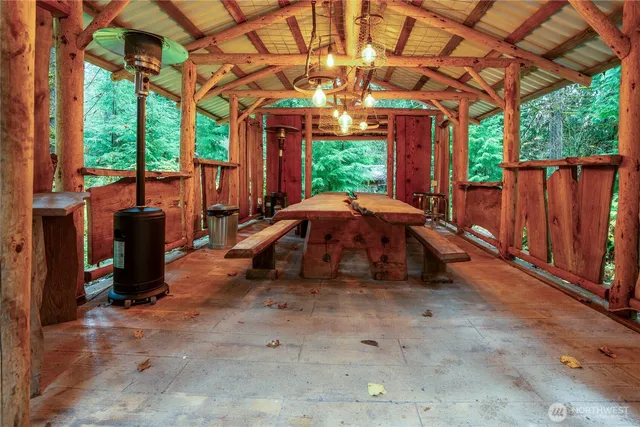 a view of a backyard with furniture and a backyard