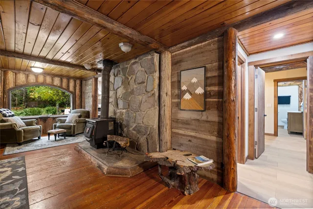 a view of a hallway with seating area