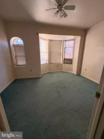 a room with furniture and natural light