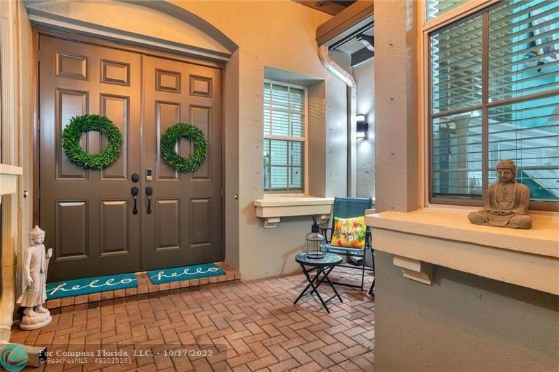 Heron Bay Parkland, FL 33076 - Photo 31 of 33 a house view with outdoor seating space