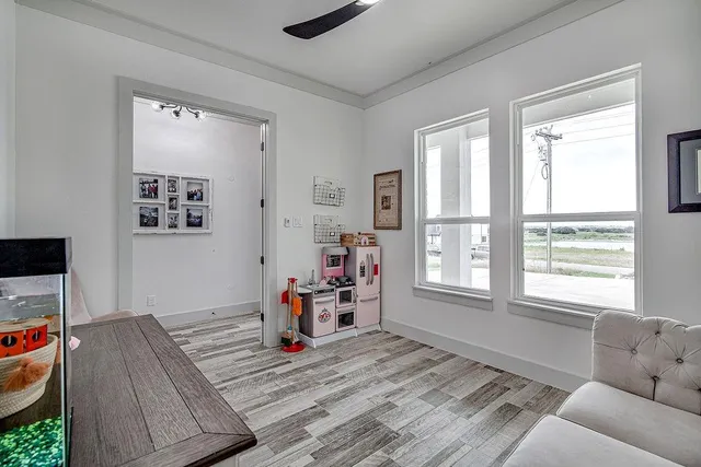 a living room with furniture and a window