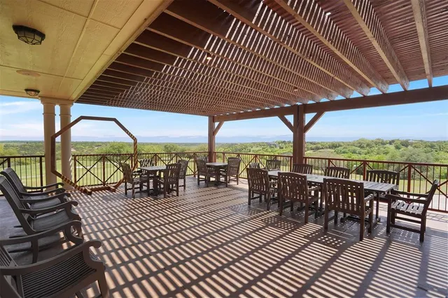 an outdoor space with patio lots of furniture