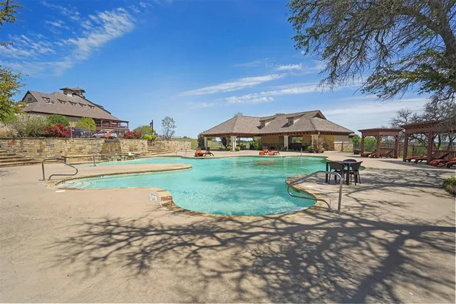 a view of a house with swimming pool