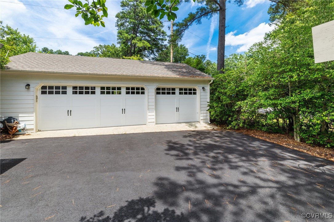 8950 Bellefonte Road Henrico, VA 23229 - Photo 47 of 50 This 3 car garage has PLENTY of extra storage. El