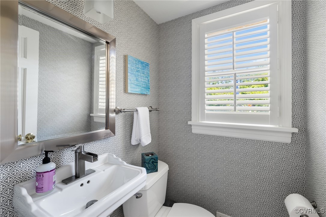 8950 Bellefonte Road Henrico, VA 23229 - Photo 10 of 50 Powder Room with pedestal sink and plantation shut
