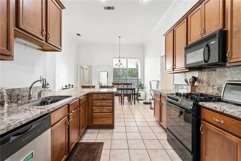 $355,000 | 2424 Cours Carson Street, Mandeville, LA 70448