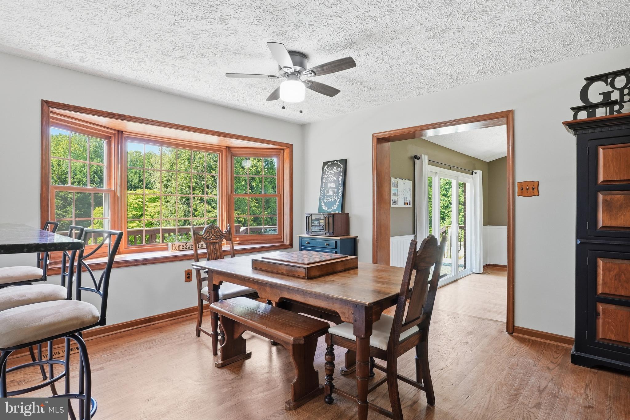6118 Fishers Station Road Lothian, MD 20711 - Photo 11 of 62 a view of a dining room with furniture window and outside view