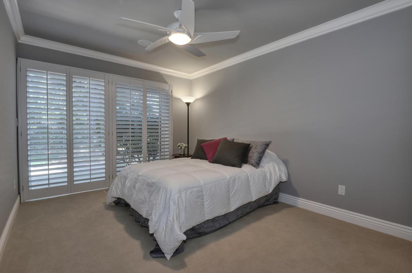 815 Patrol Road Woodside, CA 94062 - Photo 11 of 16 a bed sitting in a spacious bedroom next to a window