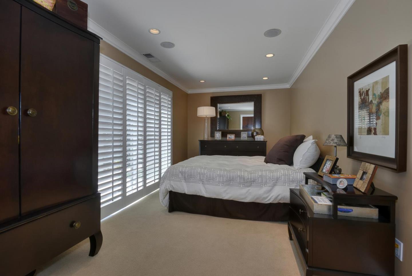 815 Patrol Road Woodside, CA 94062 - Photo 14 of 16 a bedroom with a bed and wooden floor