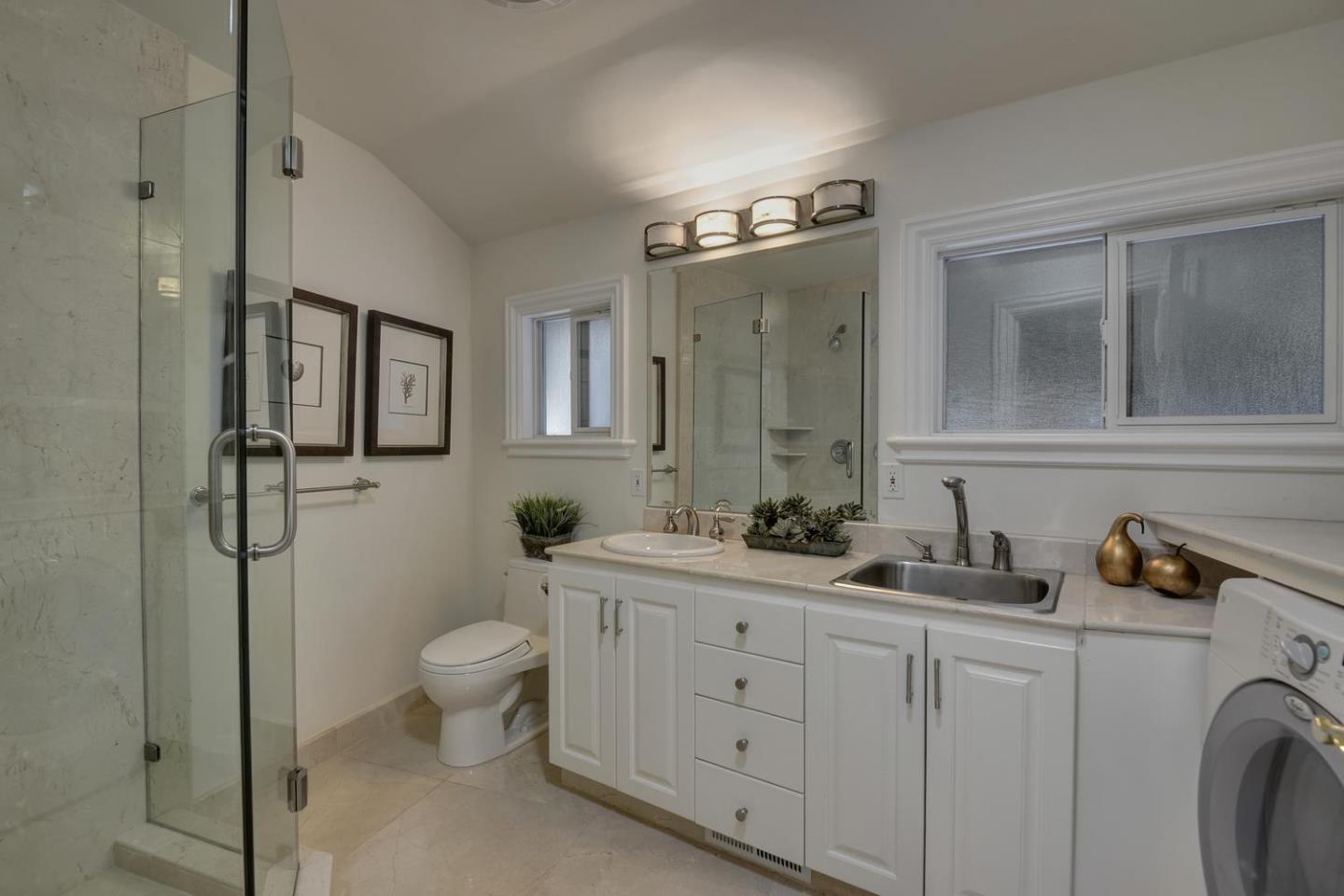 815 Patrol Road Woodside, CA 94062 - Photo 16 of 16 a bathroom with a toilet sink and mirror