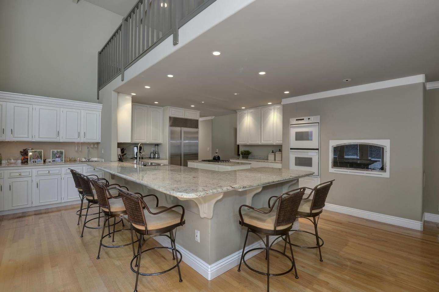 815 Patrol Road Woodside, CA 94062 - Photo 6 of 16 a kitchen with a table and chairs in it