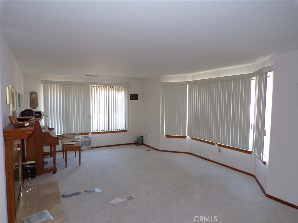 6985 Withers Road Riverside, CA 92506 - Photo 3 of 11 a view of a livingroom with furniture and a window