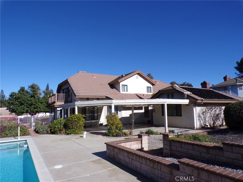 6985 Withers Road Riverside, CA 92506 - Photo 10 of 11 a front view of a house with garden