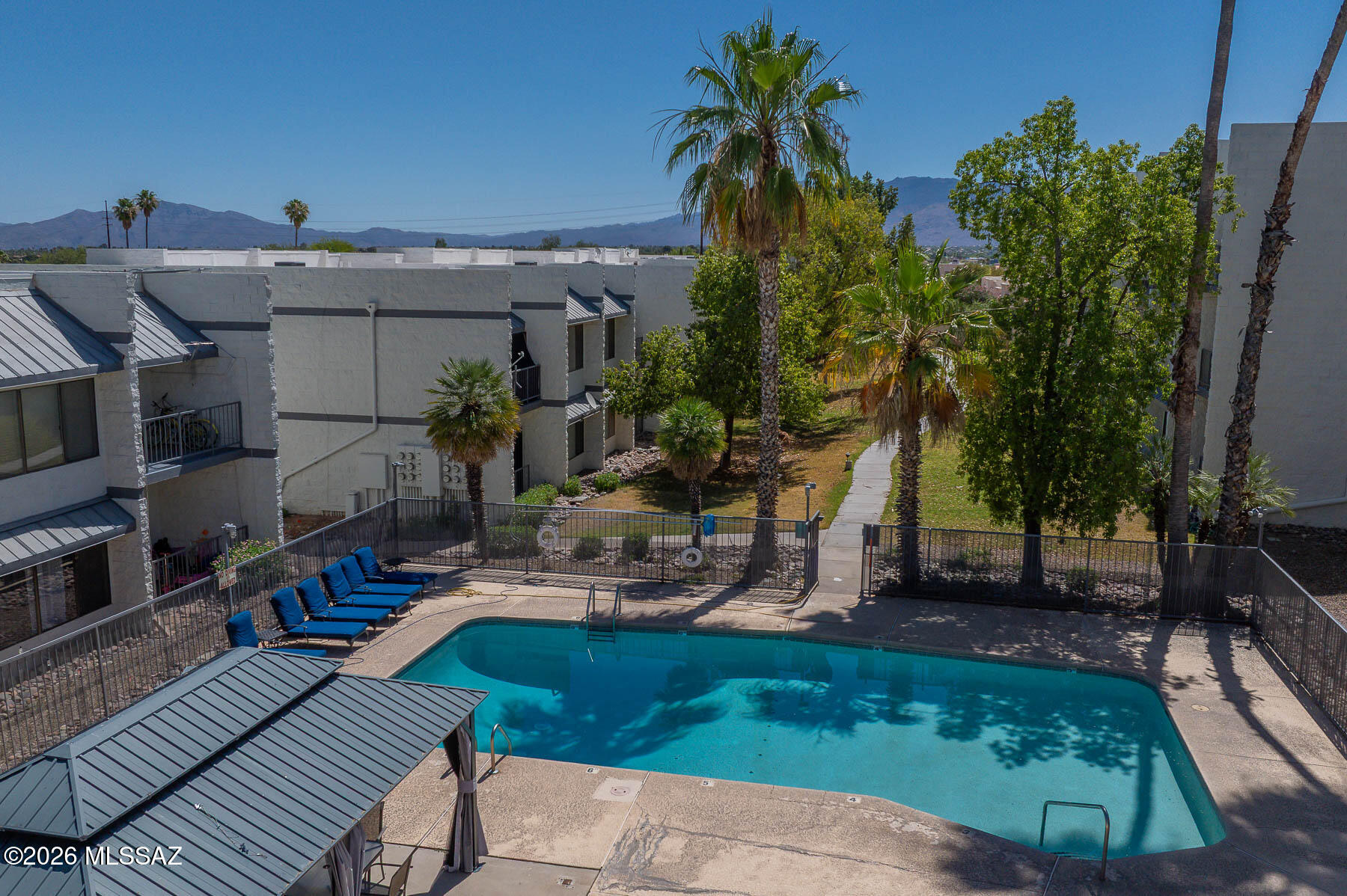 7777 East Golf Links Road, Unit 2308 Tucson, AZ 85730 - Photo 32 of 37 a view of a house with backyard and sitting area