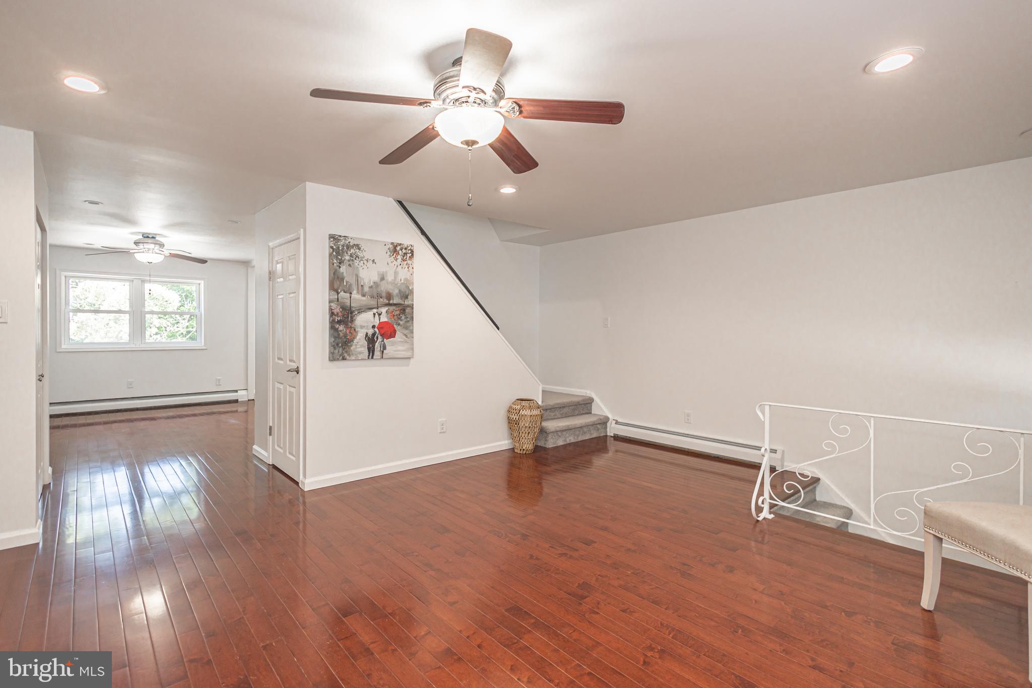 3271 Byberry Road Philadelphia, PA 19154 - Photo 7 of 34 a view of an empty room with window and wooden floor