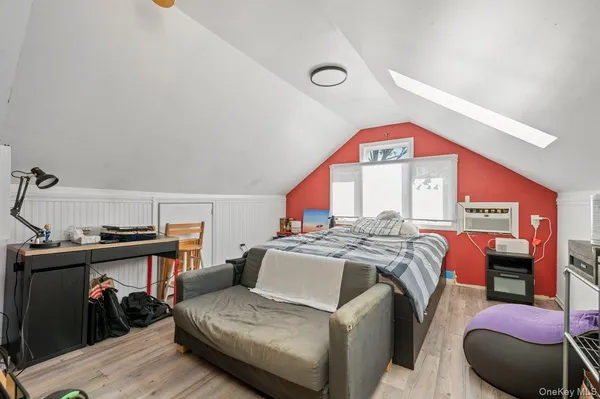 a bed room with a bed and a couch