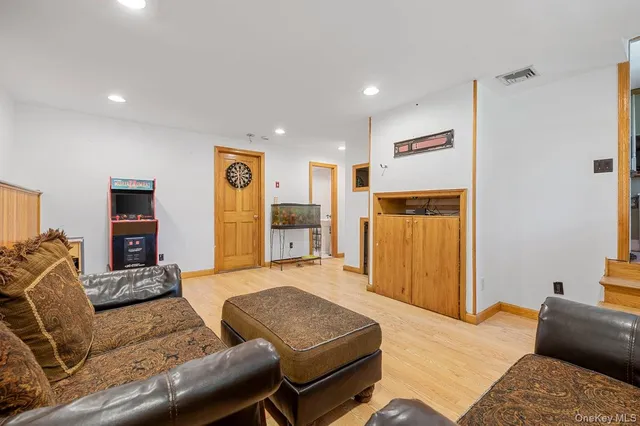 a living room with furniture and a couch
