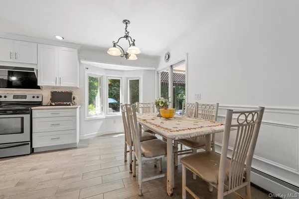 a view of a dining room with furniture