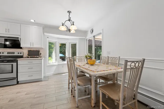 a view of a dining room with furniture