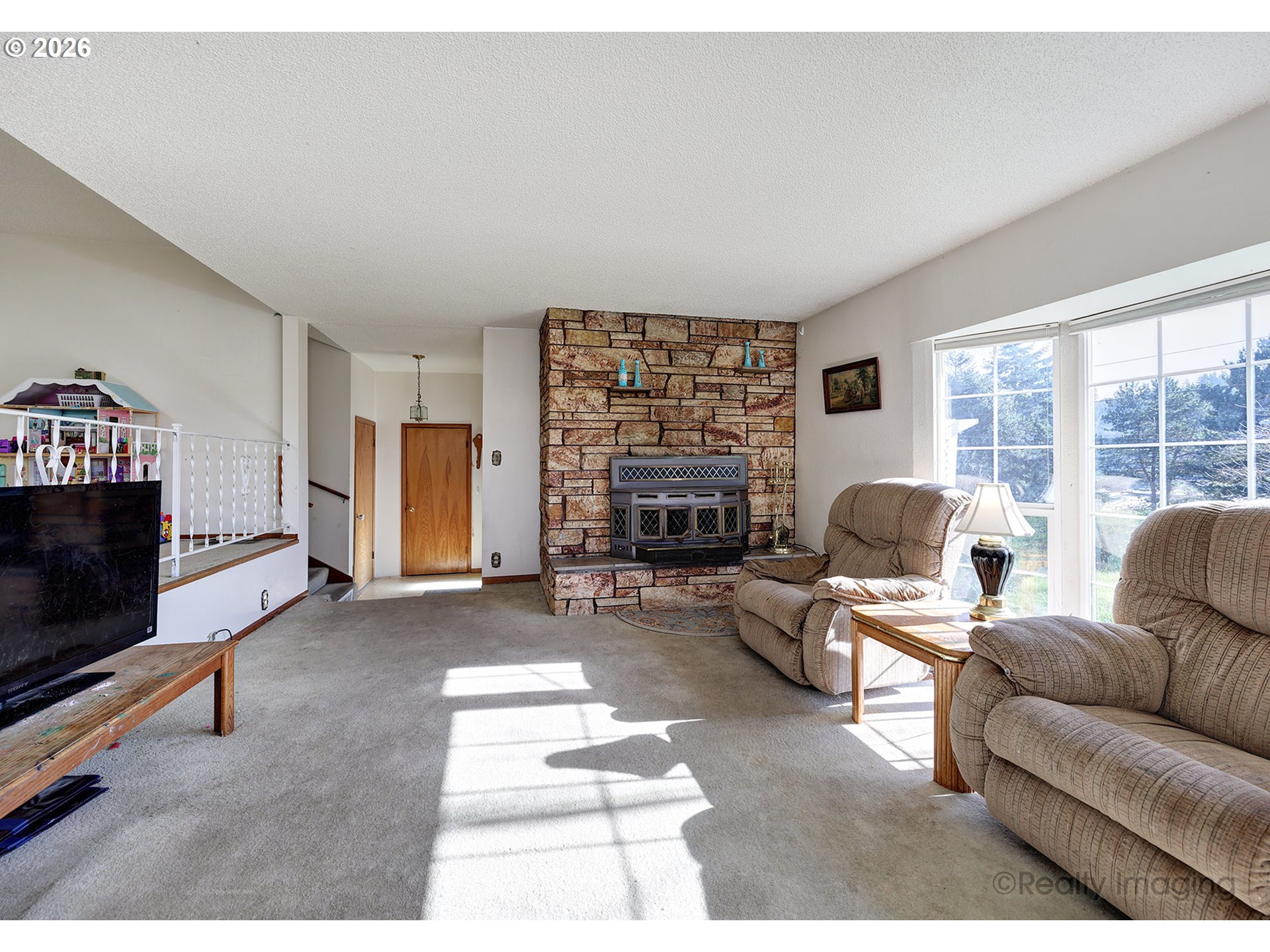 1703 Allen Street Kelso, WA 98626 - Photo 19 of 23 a living room with furniture and a fireplace