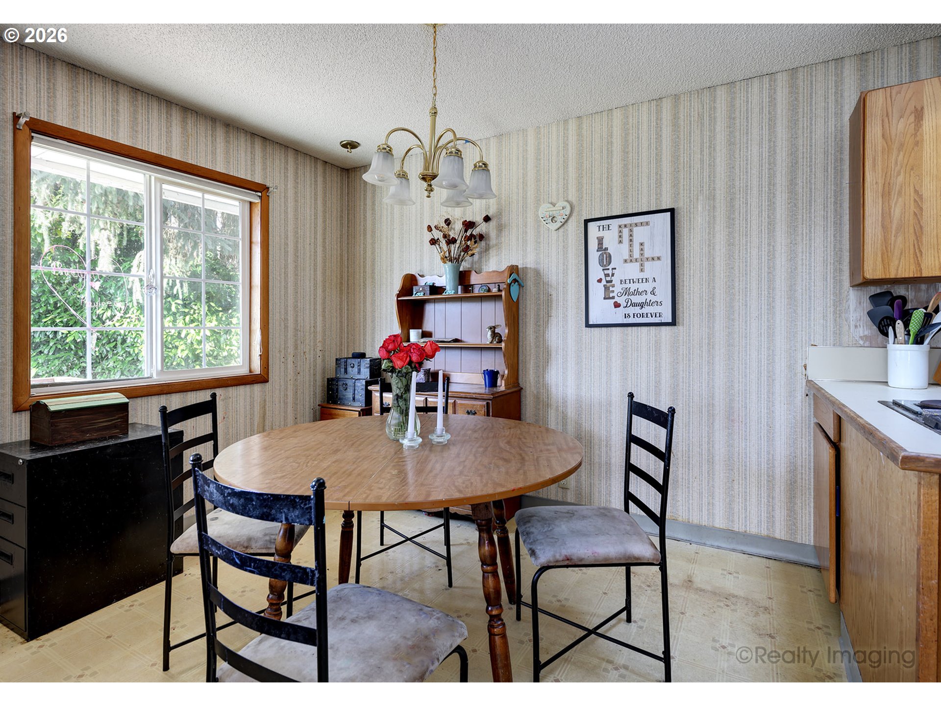 1703 Allen Street Kelso, WA 98626 - Photo 2 of 23 a view of a dining room with furniture window and outside view