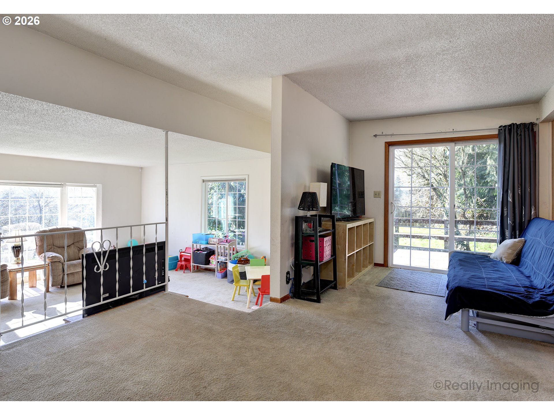 1703 Allen Street Kelso, WA 98626 - Photo 22 of 23 a living room with furniture and a flat screen tv