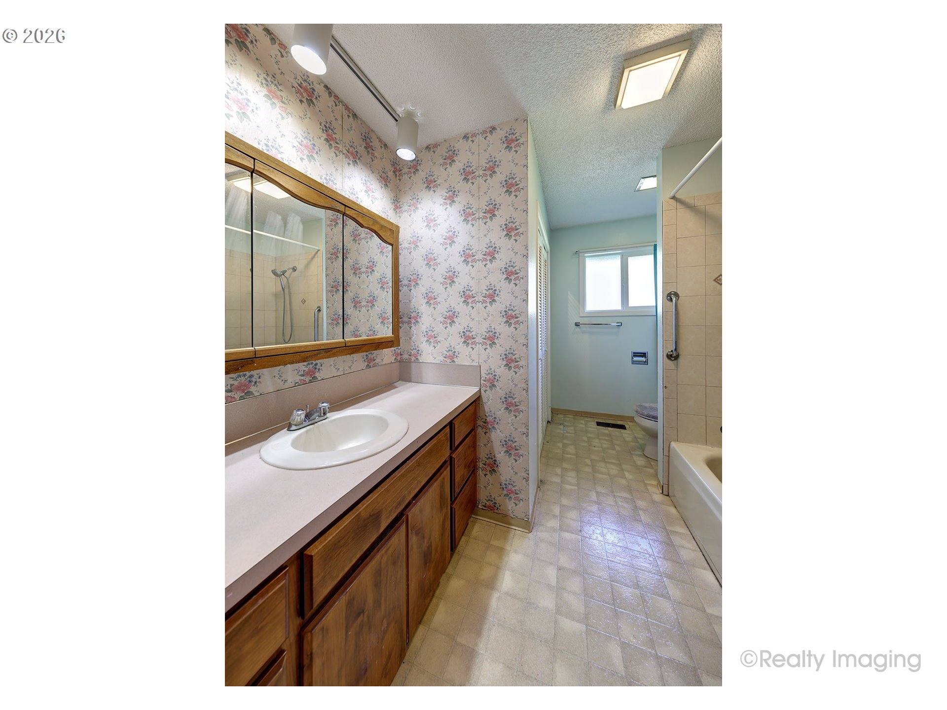 1703 Allen Street Kelso, WA 98626 - Photo 8 of 23 a bathroom with a sink and a mirror