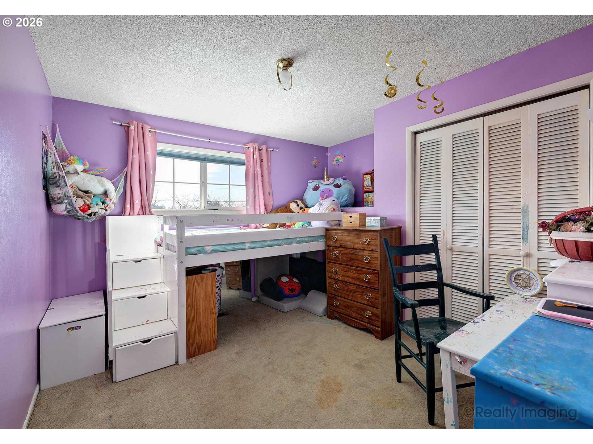 1703 Allen Street Kelso, WA 98626 - Photo 9 of 23 a bedroom with a bed and a desk