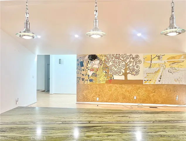 a view of a livingroom with the wooden floor