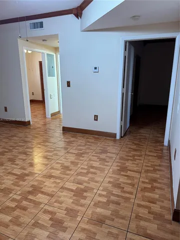 a view of a hallway with closet