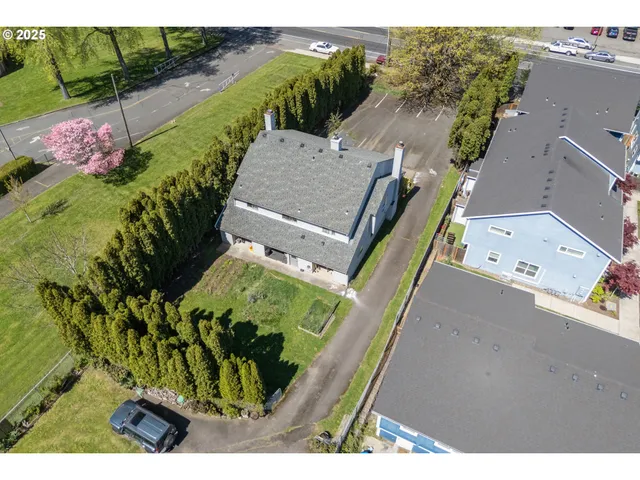 a view of a garden with an outdoor space