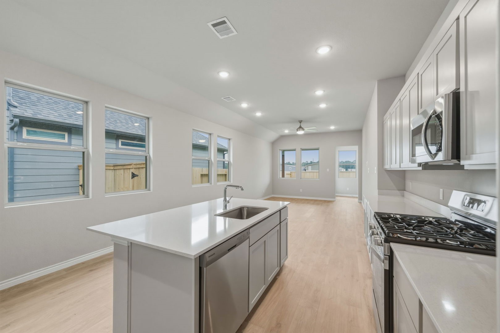 31010 Rena Coast Drive Huffman, TX 77336 - Photo 7 of 28 Kitchen in the Cedar home plan by Trophy Signature Homes – REPRESENTATIVE PHOTO