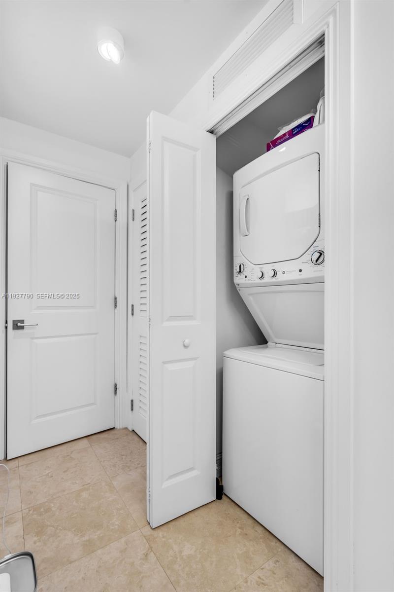 1650 Galiano Street, Unit 311 Coral Gables, FL 33134 - Photo 18 of 32 a utility room with dryer and washer