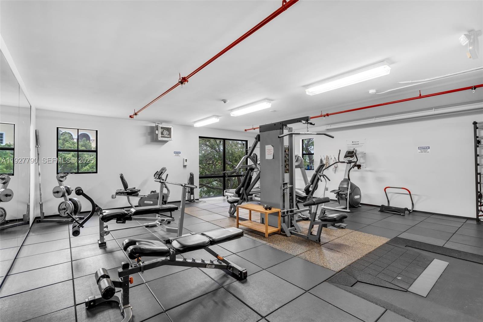 1650 Galiano Street, Unit 311 Coral Gables, FL 33134 - Photo 26 of 32 a view of a room with gym equipment